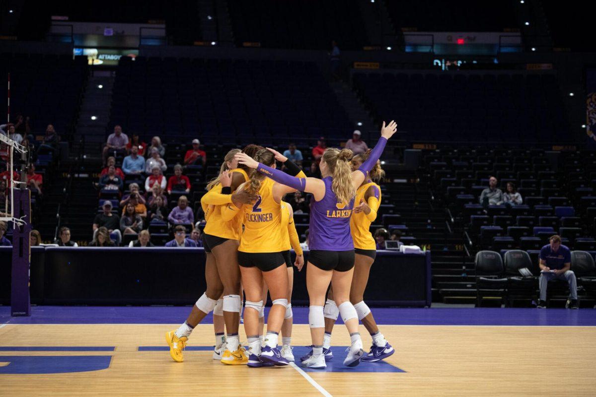 The LSU volleyball team comes together after a point on Saturday, Oct. 1, 2022, during LSU&#8217;s 2-3 defeat to Ole Miss at the Pete Maravich Assembly Center in Baton Rouge, La.