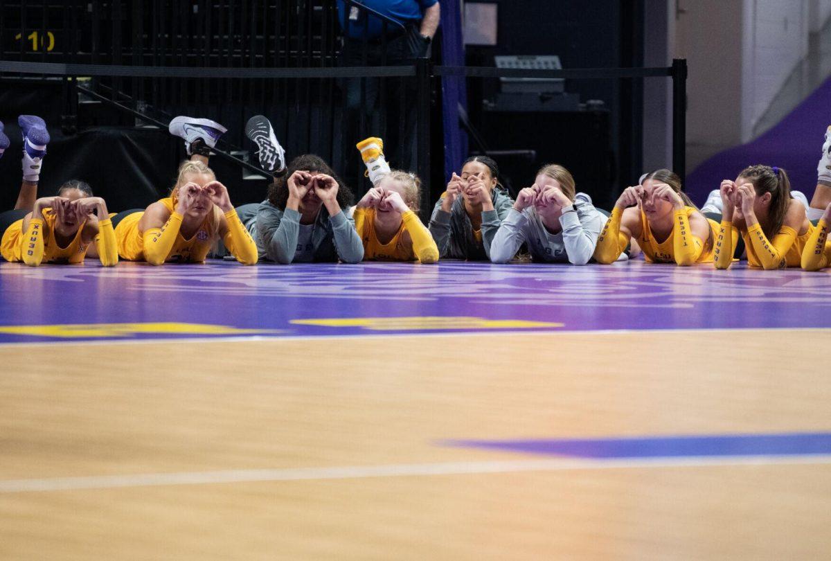 LSU volleyball players support their team from the side on Saturday, Oct. 1, 2022, during LSU&#8217;s 2-3 defeat to Ole Miss at the Pete Maravich Assembly Center in Baton Rouge, La.