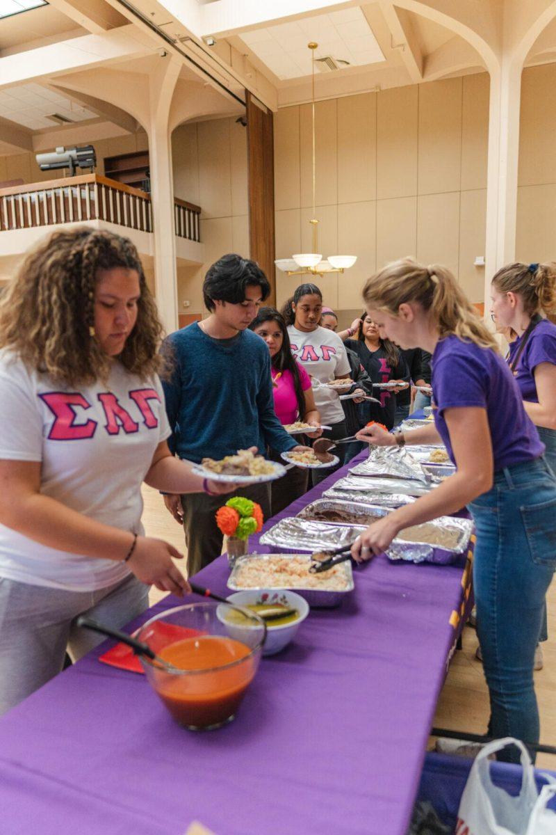 Students and guests wait in line for food on Friday, Sept. 30, 2022, during Latinx Night at the LSU Union Ballroom.