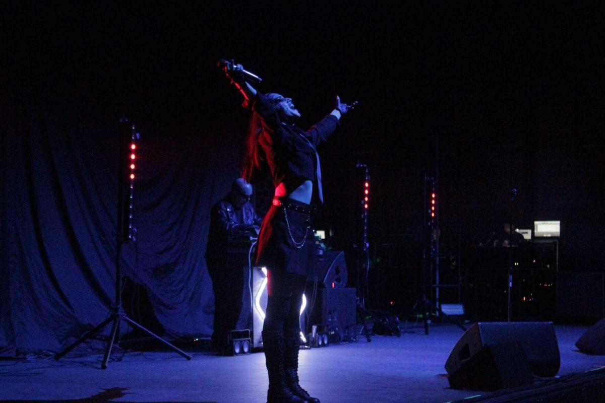 Lead singer Emily Kavanaugh stands in the center of the stage as the electro-goth duo Night Club opens for Puscifer at the Baton Rouge River Center Theater on Saturday Oct. 29, 2022.