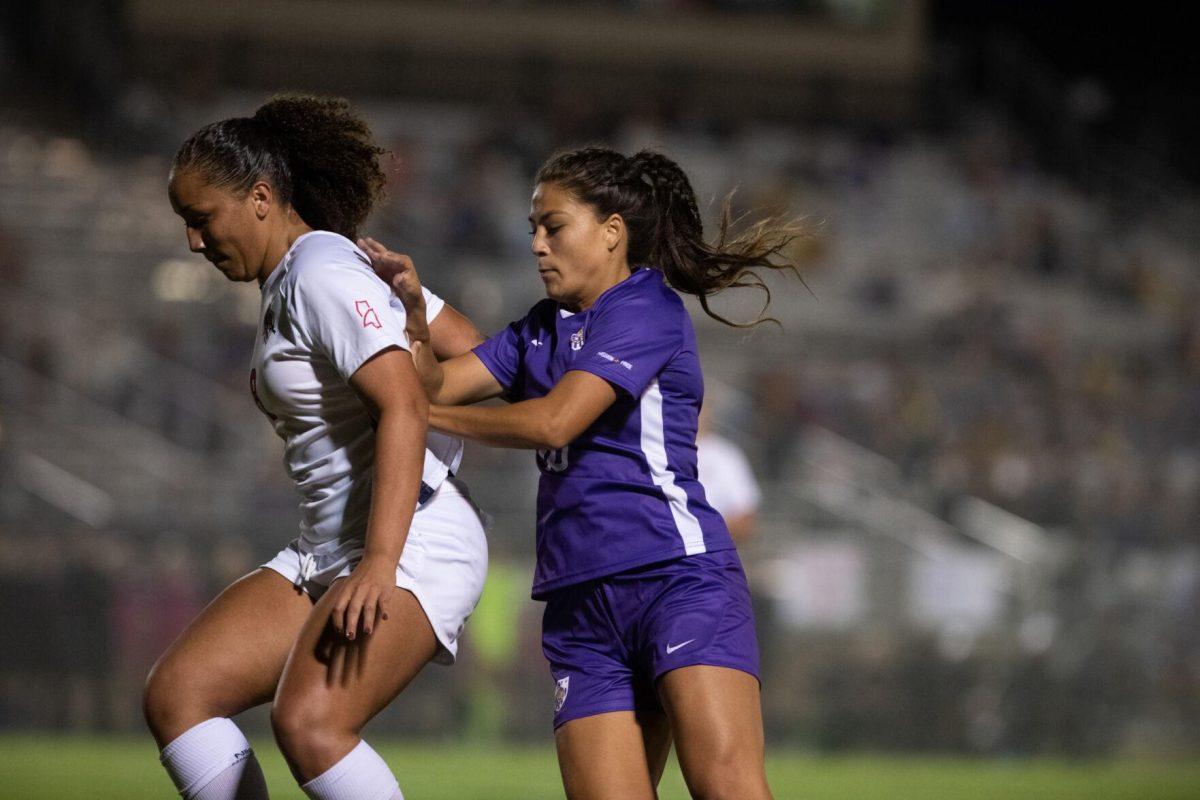 LSU soccer fifth-year senior forward Alesia Garcia (10) fights for the ball on Thursday, Oct. 27, 2022, during LSU&#8217;s 4-1 victory against Ole Miss at LSU&#8217;s Soccer Stadium off of Nicholson Drive.