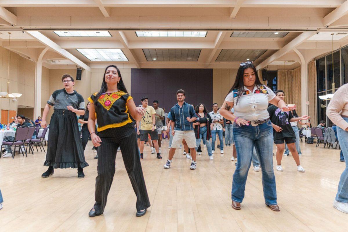 Attendees dance the night away on Friday, Sept. 30, 2022, during Latinx Night at the LSU Union Ballroom.