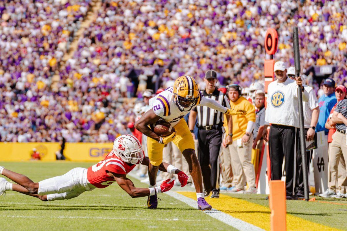 LSU football junior wide receiver Kyren Lacy (2) steps out of bounds on Saturday, Oct. 22, 2022, during LSU&#8217;s 45-20 victory over Ole Miss in Tiger Stadium in Baton Rouge, La.