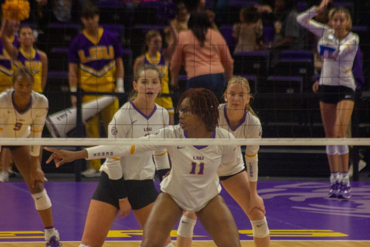 LSU volleyball senior middle blocker Anita Anwusi (11) talks to her teammates on Friday, Sept. 30, 2022, during their 3-2 victory against Ole Miss at the Pete Maravich Assembly Center in Baton Rouge, La.