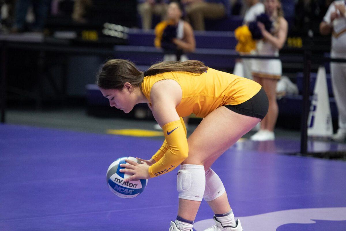 LSU volleyball freshman defensive specialist Bri Zamora (15) prepares to serve the ball on Sunday, Oct. 30, 2022, during LSU&#8217;s 3-2 loss to Mississippi State at the Pete Maravich Assembly Center in Baton Rouge, La.