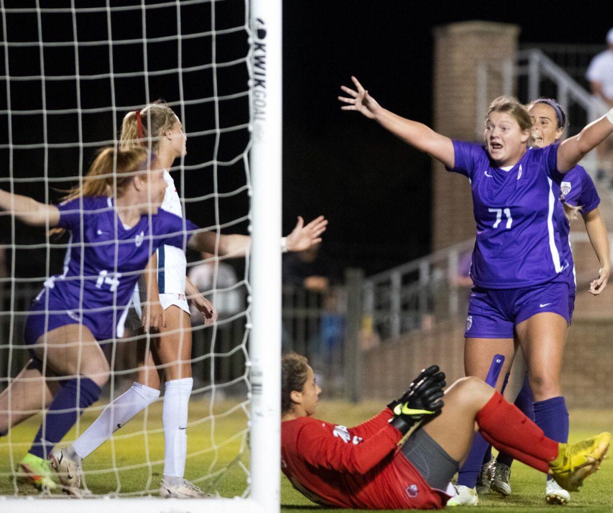 LSU soccer senior defender Anna Rockett (14) and junior forward Mollie Baker (71) celebrate after Rockett scores her first collegiate goal on Thursday, Oct. 27, 2022, during LSU&#8217;s 4-1 victory against Ole Miss at LSU&#8217;s Soccer Stadium off of Nicholson Drive.