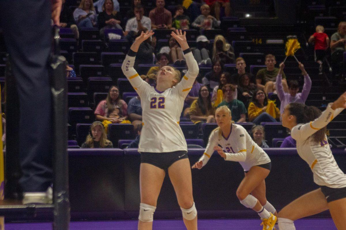 LSU volleyball freshman setter Maddie Waak (22) watches for the ball on Friday, Sept. 30, 2022, during their 3-2 victory against Ole Miss at the Pete Maravich Assembly Center in Baton Rouge, La.