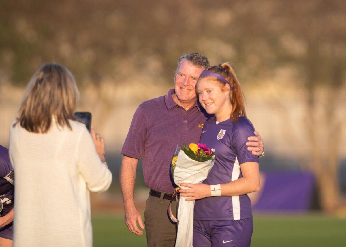 LSU soccer senior defender Anna Rockett (14) smiles with her family on senior night on Thursday, Oct. 27, 2022, before the start of LSU&#8217;s 4-1 victory against Ole Miss at LSU&#8217;s Soccer Stadium off of Nicholson Drive.