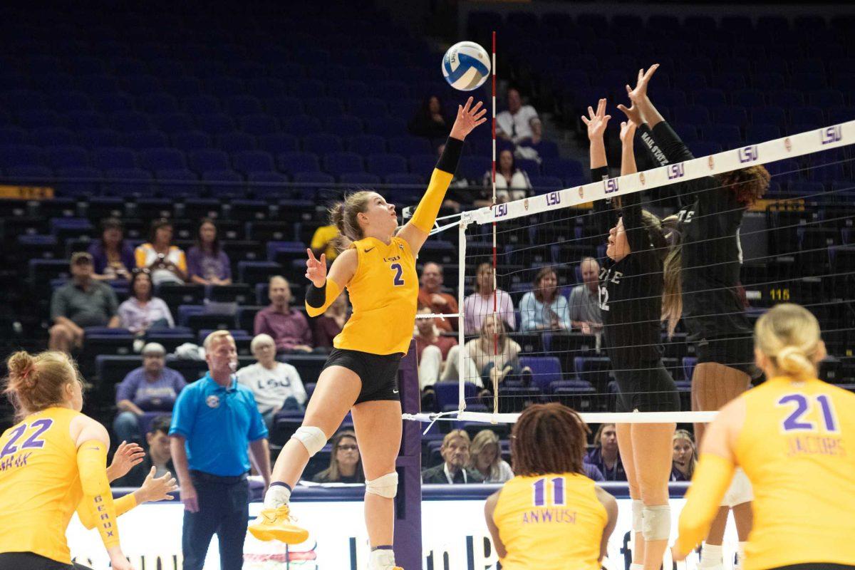 LSU volleyball junior outside hitter Paige Flickinger (2) reaches for the ball on Sunday, Oct. 30, 2022, during LSU&#8217;s 3-2 loss to Mississippi State at the Pete Maravich Assembly Center in Baton Rouge, La.