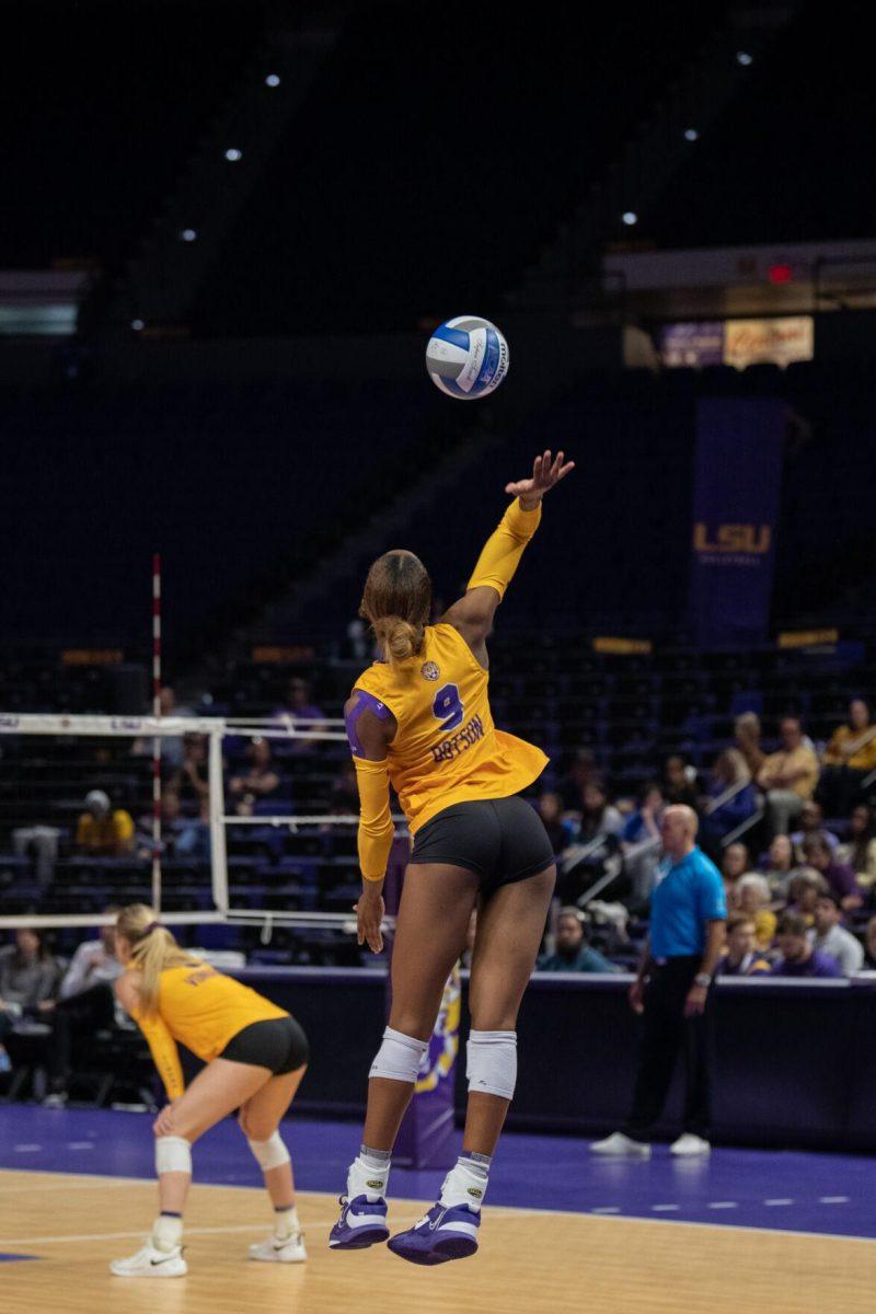 LSU volleyball senior outside hitter Sanaa Dotson (9) serves the ball on Saturday, Oct. 1, 2022, during LSU&#8217;s 2-3 defeat to Ole Miss at the Pete Maravich Assembly Center in Baton Rouge, La.