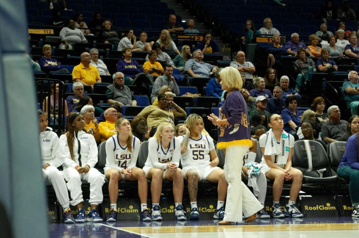 LSU women's basketball head coach Kim Mulkey talks to players on the bench at an exhibition game against Mississippi College on Thursday, Oct. 27, 2022, in the Pete Maravich Assembly Center on N. Stadium Drive.