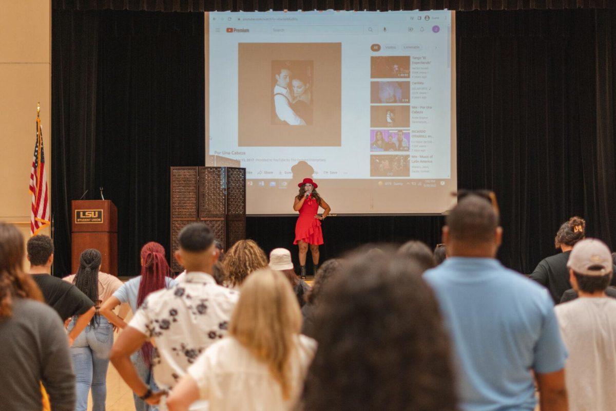 The dance instructor comes out in a new outfit on Friday, Sept. 30, 2022, during Latinx Night at the LSU Union Ballroom.