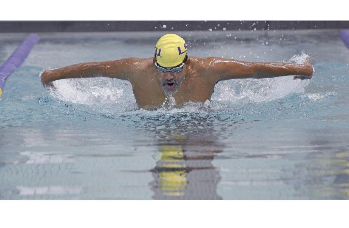 Herman Kelly practices swimming in the LSU University Recreation pool in June 2019.