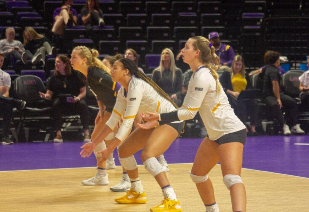 LSU volleyball players line up as Ole Miss serves the ball on Friday, Sept. 30, 2022, during their 3-2 victory against Ole Miss at the Pete Maravich Assembly Center in Baton Rouge, La.