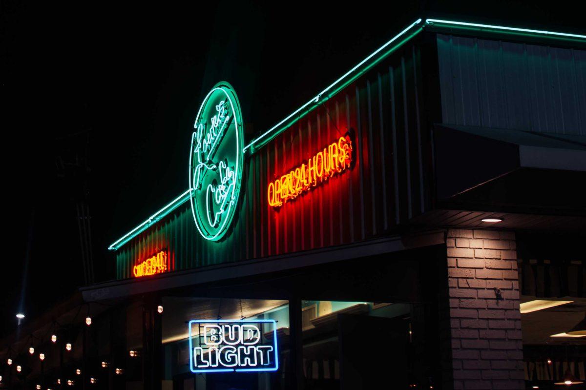 Louie's Cafe signs shine bright Saturday, Sept. 19, 2020 on Lake Street near LSU's campus.