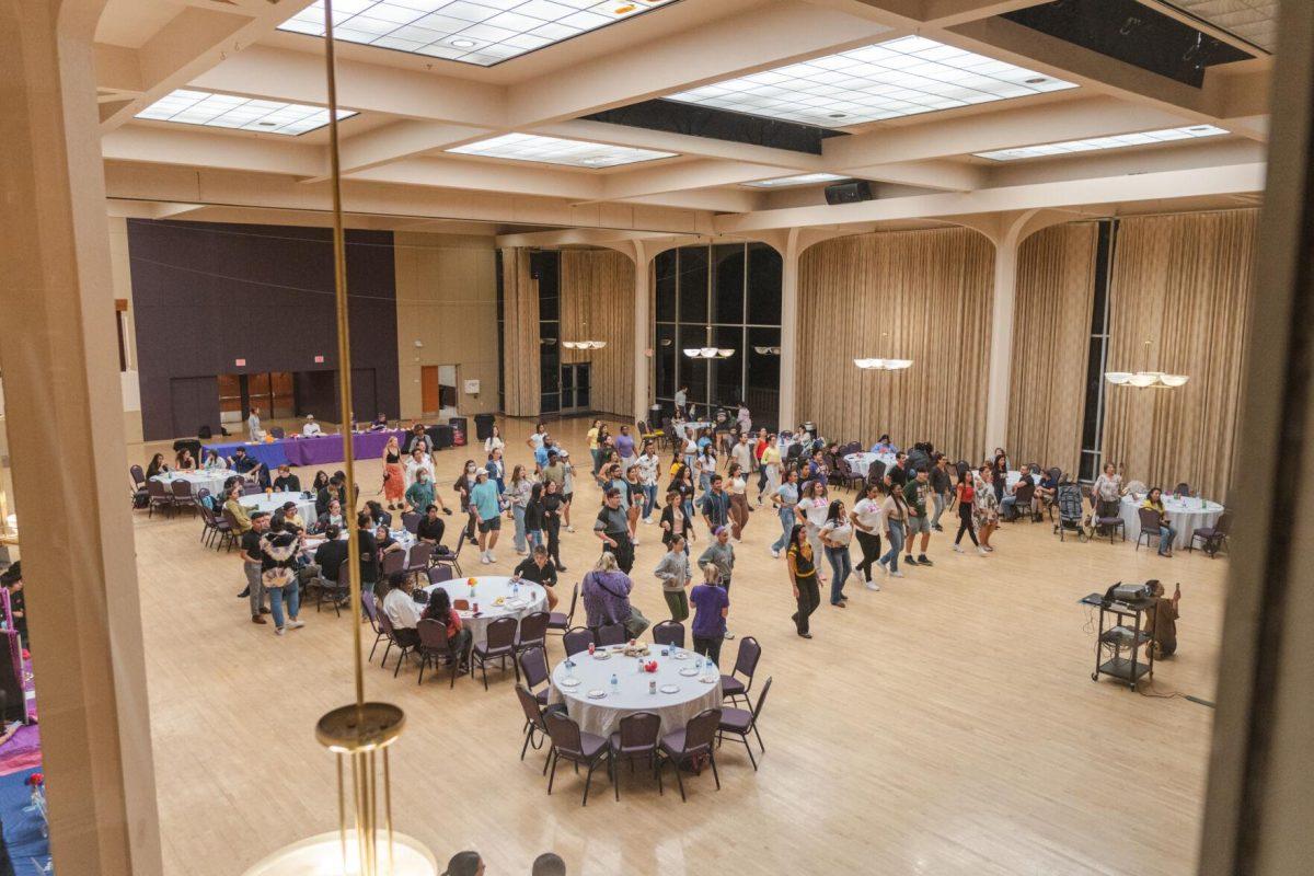 Many attendees enjoy themselves on the dancefloor on Friday, Sept. 30, 2022, during Latinx Night at the LSU Union Ballroom.