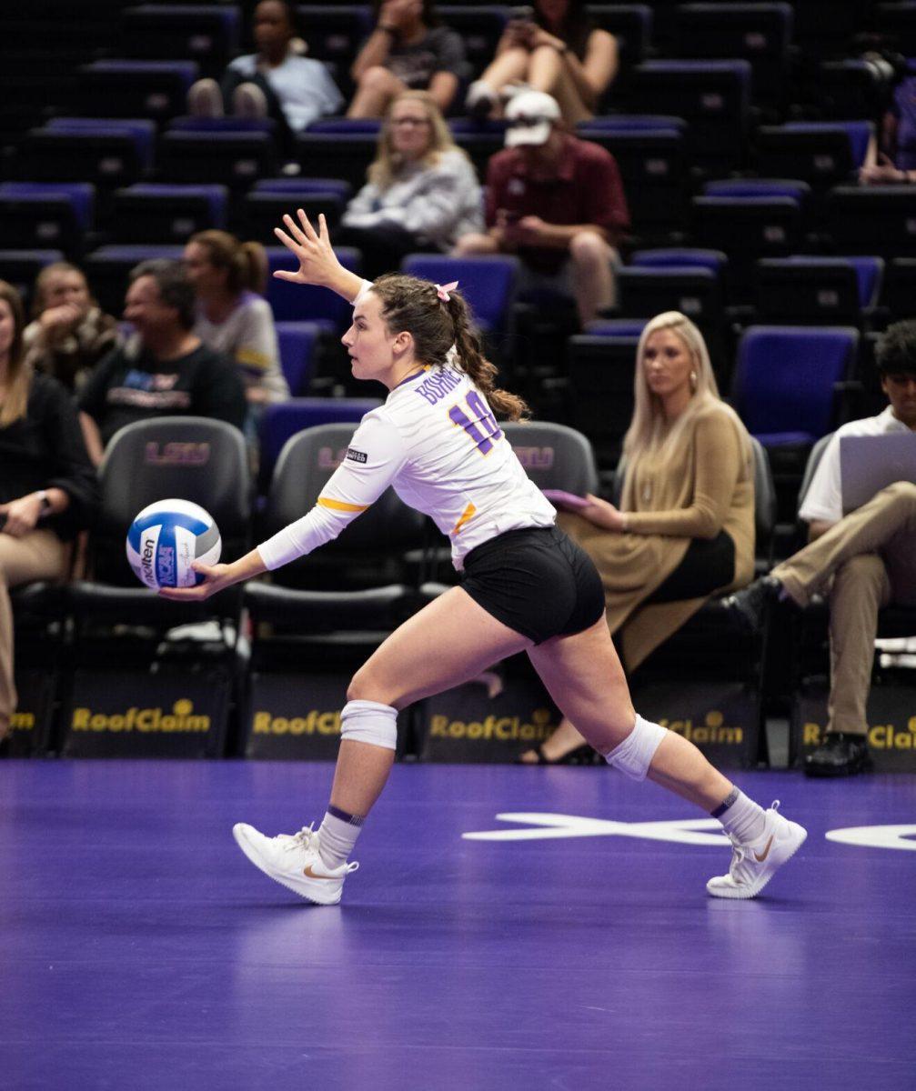 LSU volleyball senior defensive specialist Jill Bohnet (10) prepares to serve the ball on Saturday, Oct. 29, 2022, during LSU&#8217;s 3-2 victory against Mississippi State at the Pete Maravich Assembly Center in Baton Rouge, La.