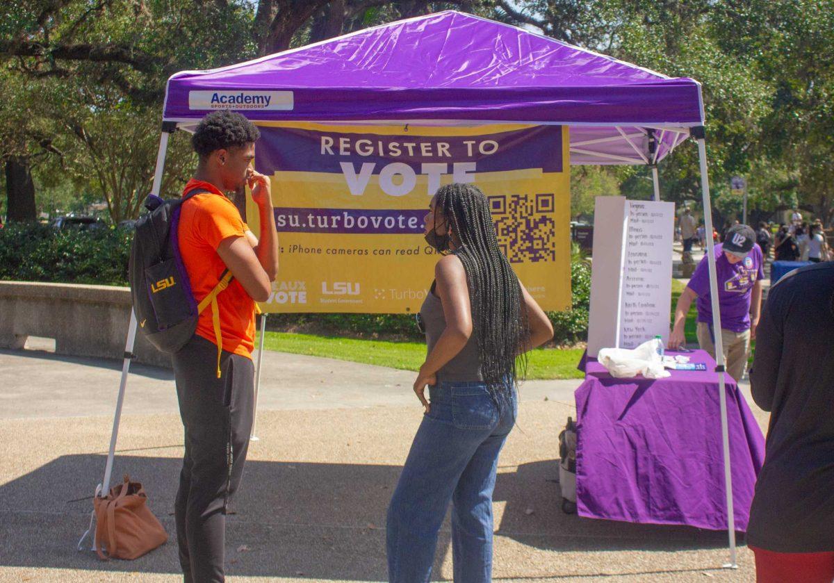 Students discuss registering to vote on Tuesday, Sept. 20, 2022, in Free Speech Plaza on Tower Drive in Baton Rouge, La.