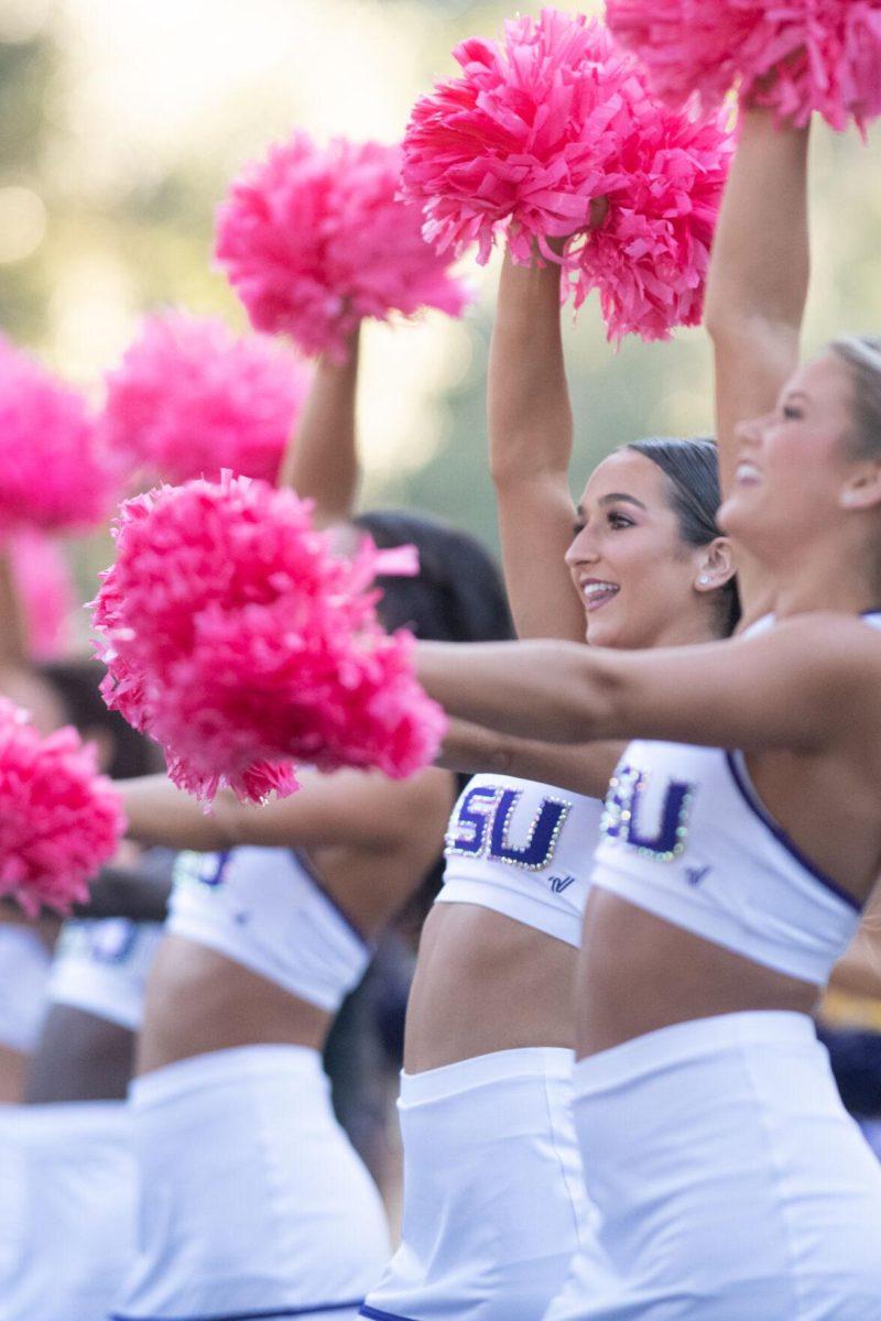 The LSU Tiger Girls cheer on Victory Hill before the start of the game against Tennessee on Saturday, Oct. 8, 2022, on North Stadium Drive.