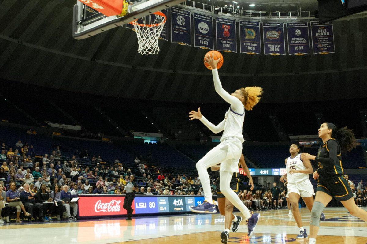 LSU women's basketball guard Jasmine Carson goes for a left-handed layup at an exhibition game against Mississippi College on Thursday, Oct. 27, 2022, in the Pete Maravich Assembly Center on N. Stadium Drive.