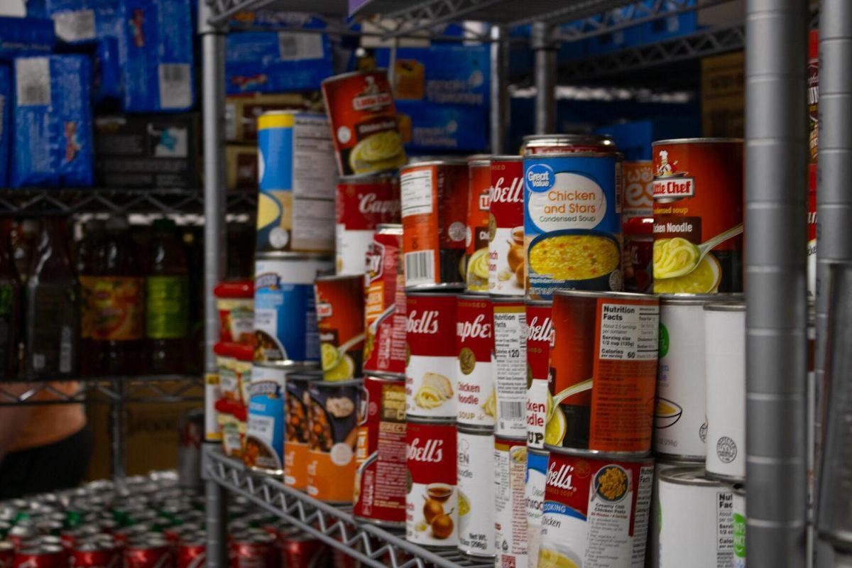 Canned goods line the shelves on Thursday, Oct. 6, 2022, inside the food pantry at the LSU Student Union in Baton Rouge, La.