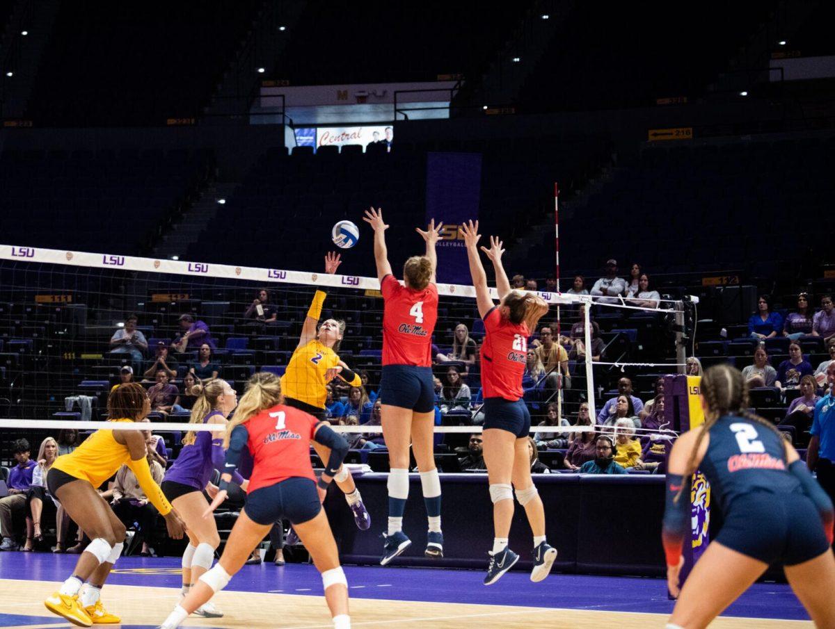 LSU volleyball junior outside hitter Paige Flickinger (2) attempts to hit the ball over the net on Saturday, Oct. 1, 2022, during LSU&#8217;s 2-3 defeat to Ole Miss at the Pete Maravich Assembly Center in Baton Rouge, La.