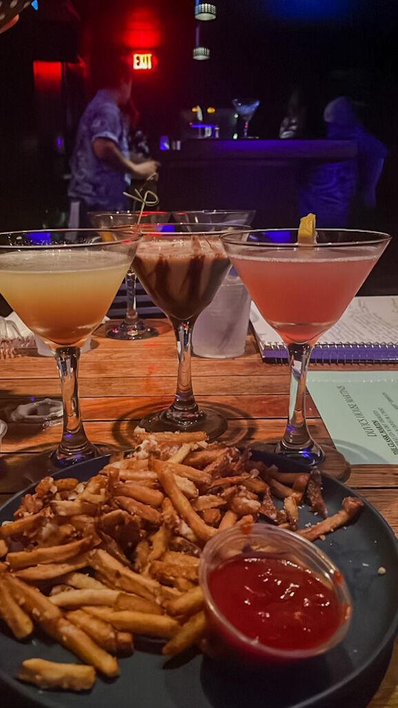 Three martinis and a plate of garlic and parmesan fries at Duvic's,&#160;2854 Kalurah St., in Baton Rouge, La.&#160;&#160;