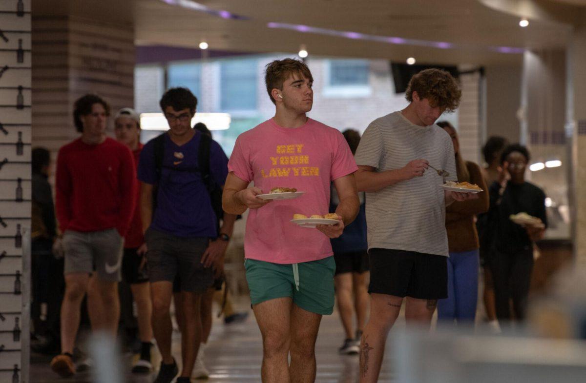 The LSU students walk on Wednesday, Oct. 5, 2022, in The 5 dining hall in Baton Rouge, La.