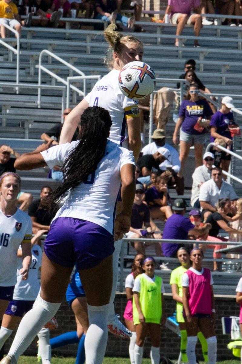 LSU soccer defenders Shannon Cooke (8) and Maya Gordon (9) both jump up for a header on Sunday, Oct. 2, 2022, during LSU&#8217;s 3-2 win against University of Kentucky at LSU&#8217;s Soccer Stadium off Nicholson Drive.