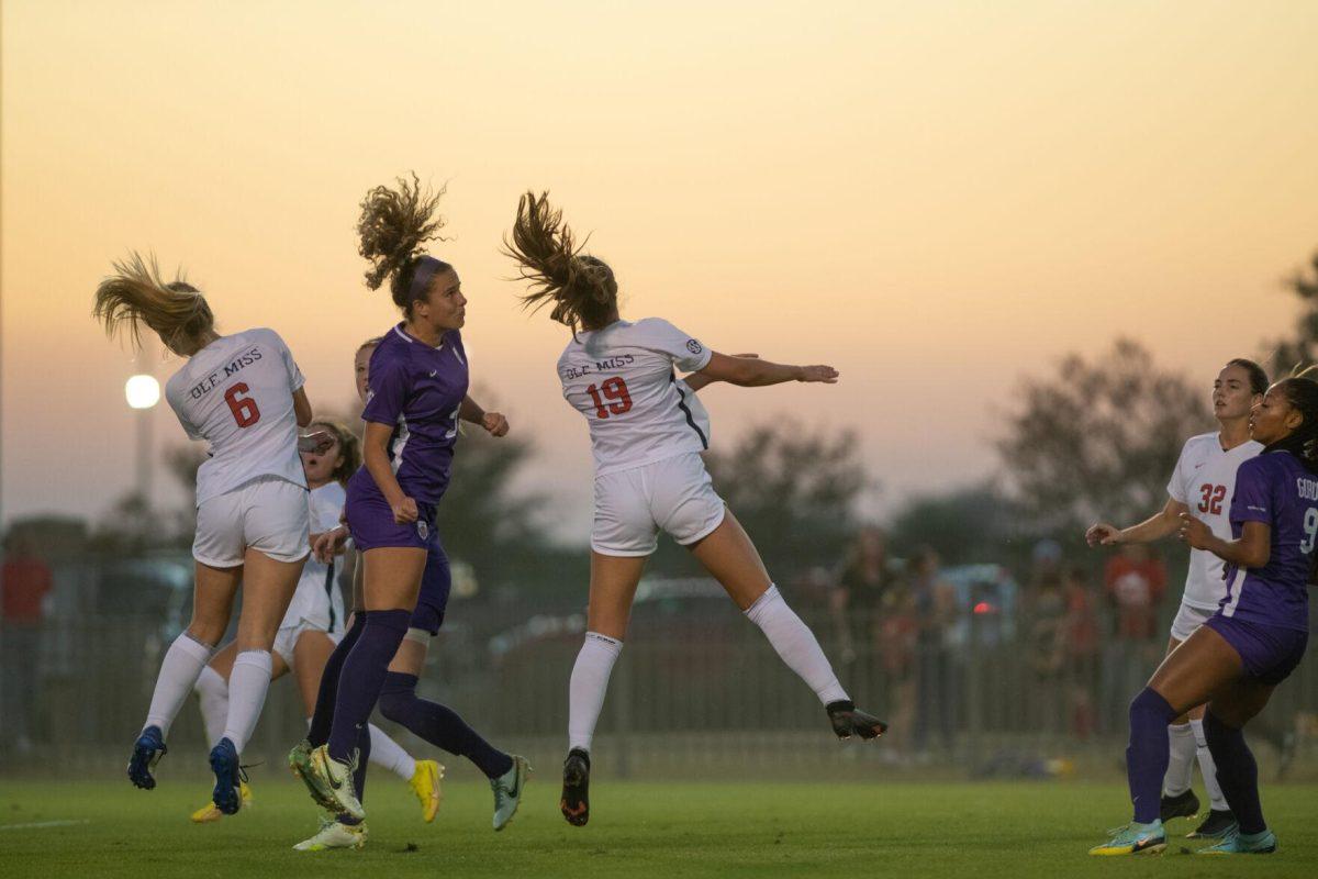 LSU soccer fifth-year senior midfielder Brenna McPartlan (20) jumps up for a header on Thursday, Oct. 27, 2022, during LSU&#8217;s 4-1 victory against Ole Miss at LSU&#8217;s Soccer Stadium off of Nicholson Drive.