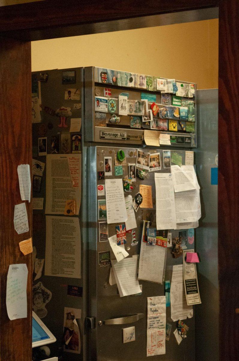 A cluster of papers, photos, magnets, and stickers decorate a refrigerator&#160;on Saturday, Oct. 1, 2022,&#160;at Highland Coffees on Highland Road in Baton Rouge, La.