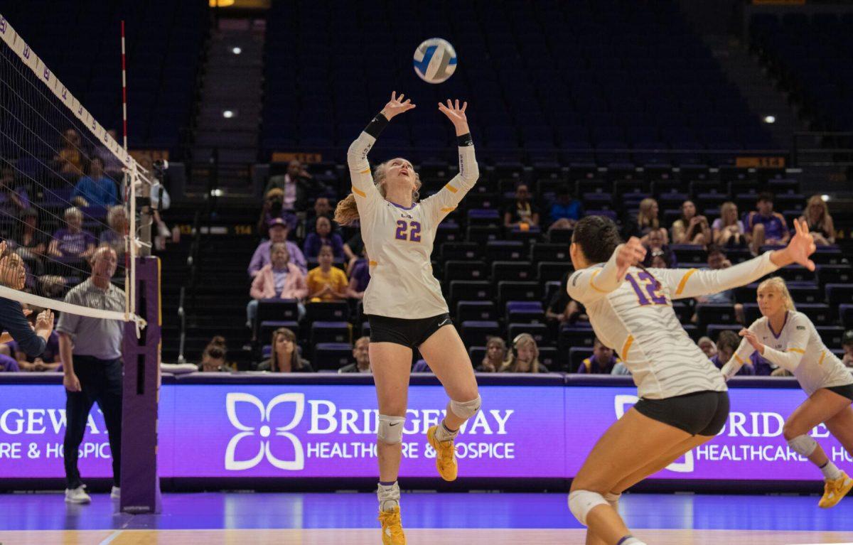 LSU volleyball freshman setter Maddie Waak (22) sets the ball on Wednesday, Oct. 5, 2022, before their 3-2 victory over Auburn in the Pete Maravich Assembly Center on N. Stadium Drive.