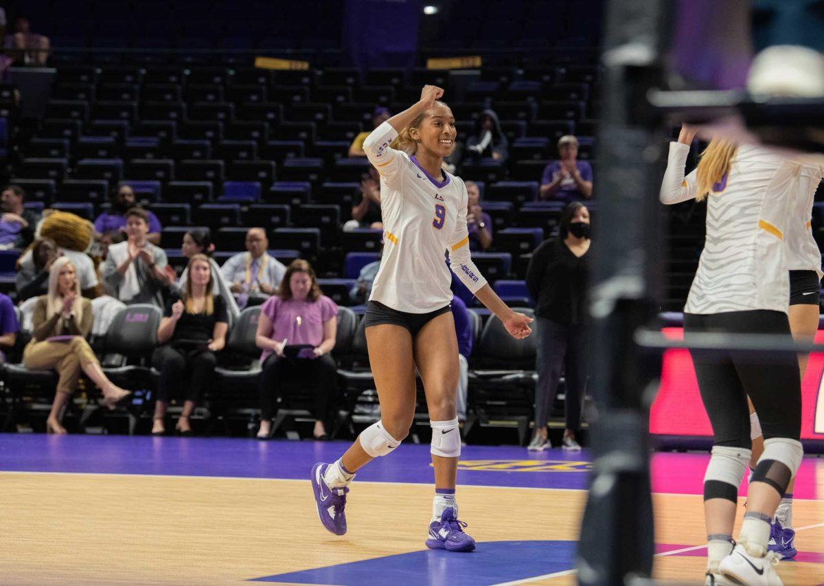 LSU volleyball senior outside hitter Sanaa Dotson (9) celebrates a point won against Auburn on Wednesday, Oct. 5, 2022, before their 3-2 victory over Auburn in the Pete Maravich Assembly Center on N. Stadium Drive.