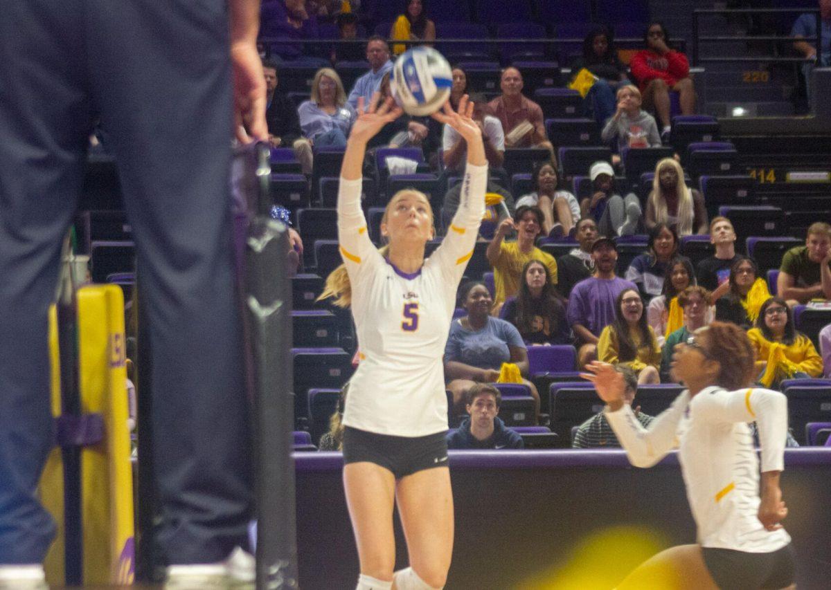 LSU graduate student setter Josie Vondran (5) sets the ball into the air on Friday, Sept. 30, 2022, during their 3-2 victory against Ole Miss at the Pete Maravich Assembly Center in Baton Rouge, La.