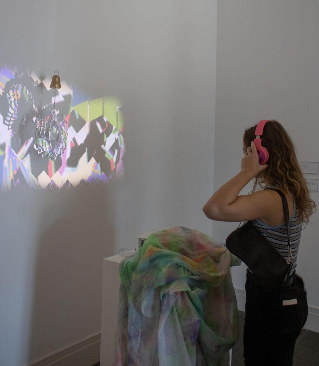 LSU animal science freshman Elizabeth Lochte listens to an interactive art display on Saturday, Oct. 1, 2022, at the Ogden Museum of Southern Art in New Orleans, La.