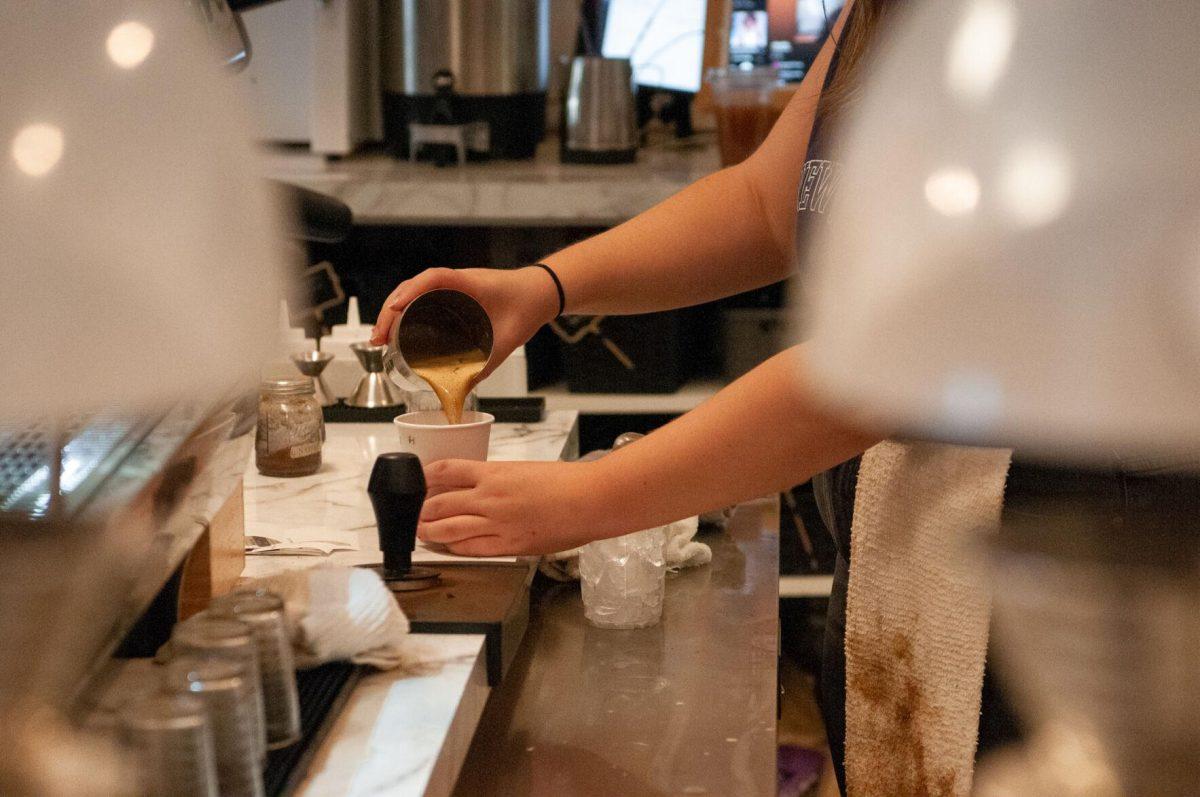 A barista expertly pours a hot beverage in a to-go cup&#160;on Sunday, Oct. 2, 2022,&#160;at Light House Coffee on Lee Drive in Baton Rouge, La.