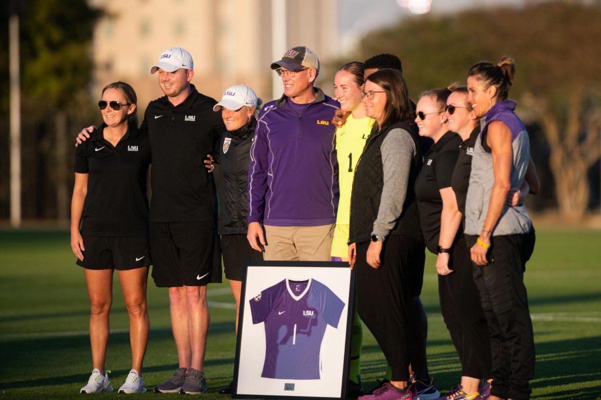 LSU soccer senior goalkeeper Mollee Swift (1) smiles with her coaches and family on senior night on Thursday, Oct. 27, 2022, before the start of LSU&#8217;s 4-1 victory against Ole Miss at LSU&#8217;s Soccer Stadium off of Nicholson Drive.