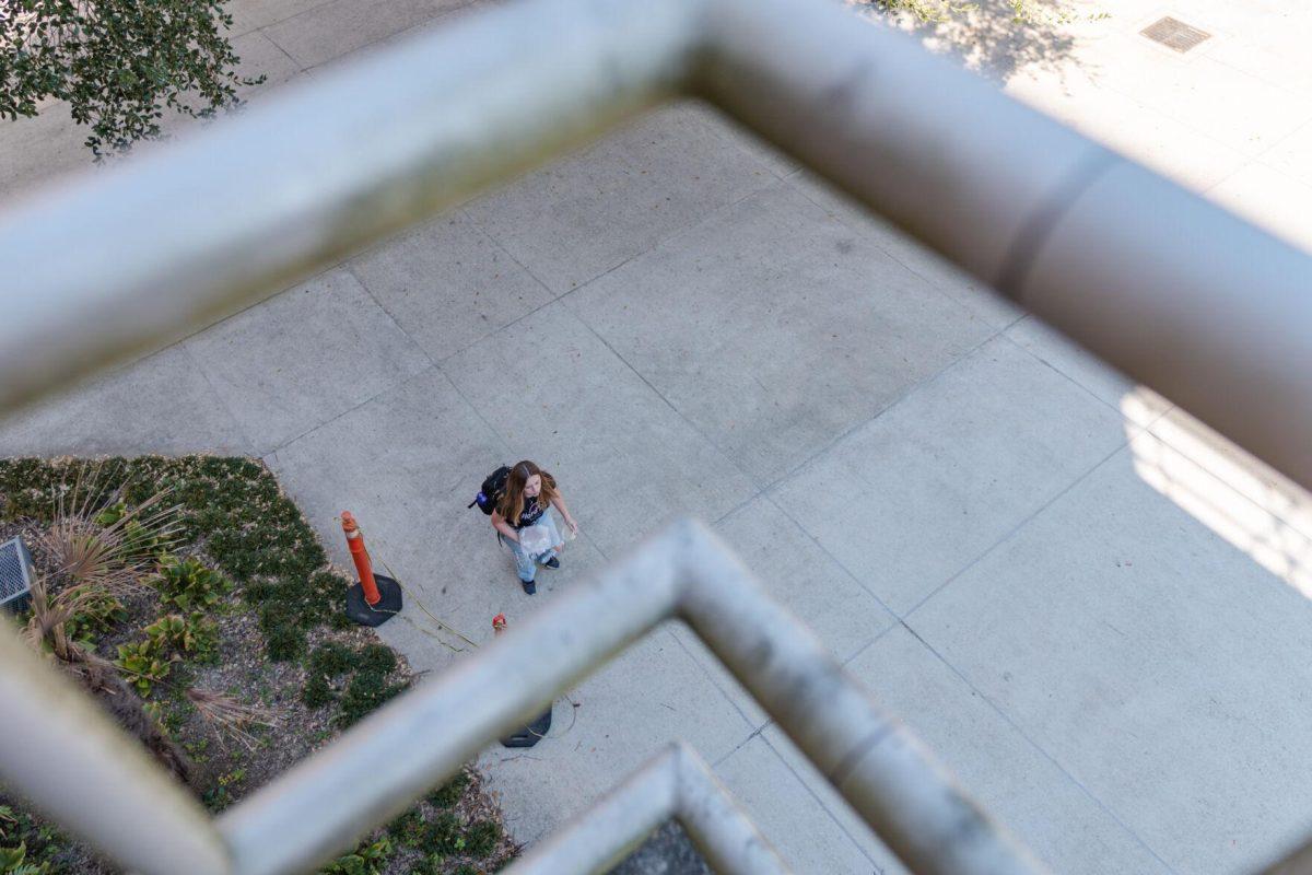 An LSU student walks on Friday, Oct. 7, 2022, past the LSU Art and Design building in Baton Rouge, La.