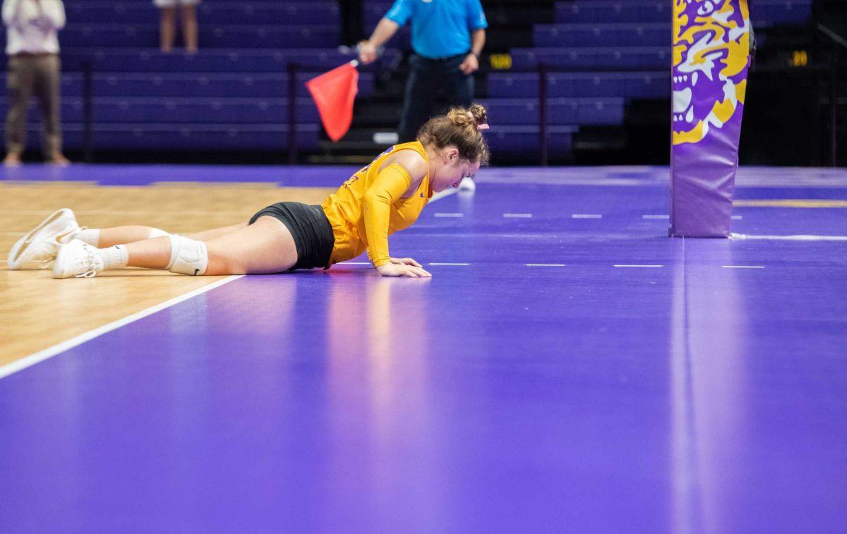 LSU volleyball senior defensive specialist Jill Bohnet (10) gets up after diving for the ball on Sunday, Oct. 30, 2022, during LSU&#8217;s 3-2 loss to Mississippi State at the Pete Maravich Assembly Center in Baton Rouge, La.