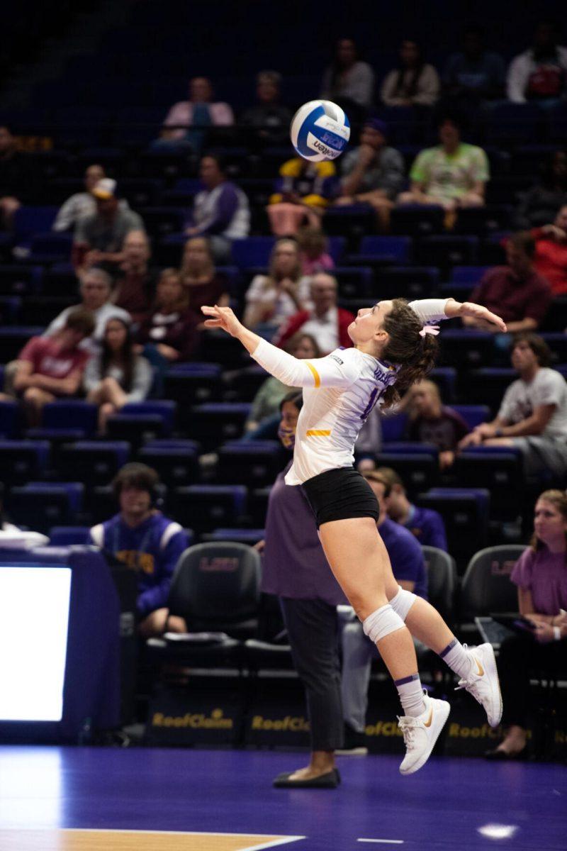 LSU volleyball senior defensive specialist Jill Bohnet (10) serves the ball on Saturday, Oct. 29, 2022, during LSU&#8217;s 3-2 victory against Mississippi State at the Pete Maravich Assembly Center in Baton Rouge, La.