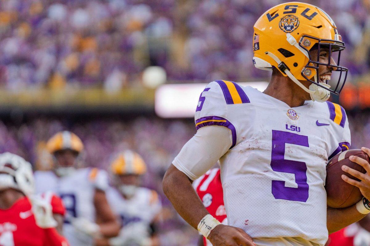 LSU football junior quarterback Jayden Daniels (5) smiles in the endzone on Saturday, Oct. 22, 2022, during LSU&#8217;s 45-20 victory over Ole Miss in Tiger Stadium in Baton Rouge, La.