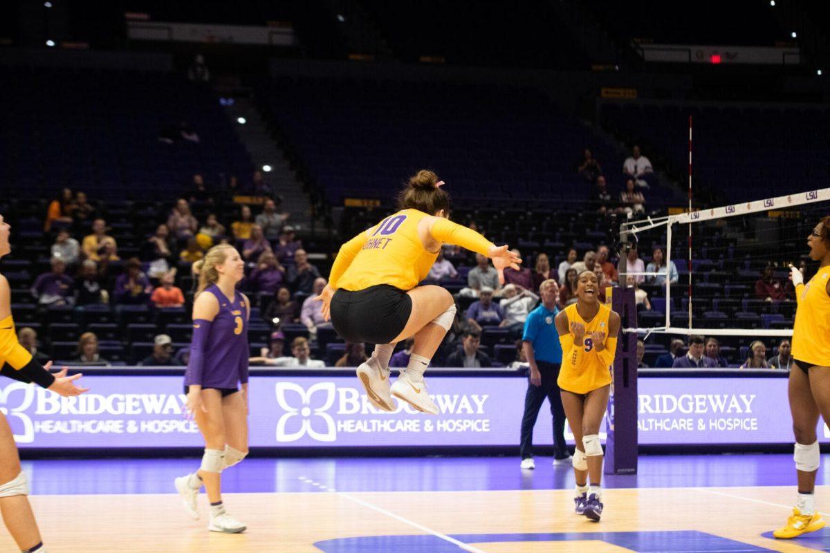 LSU volleyball senior defensive specialist Jill Bohnet (10) celebrates a point on Sunday, Oct. 30, 2022, during LSU&#8217;s 3-2 loss to Mississippi State at the Pete Maravich Assembly Center in Baton Rouge, La.