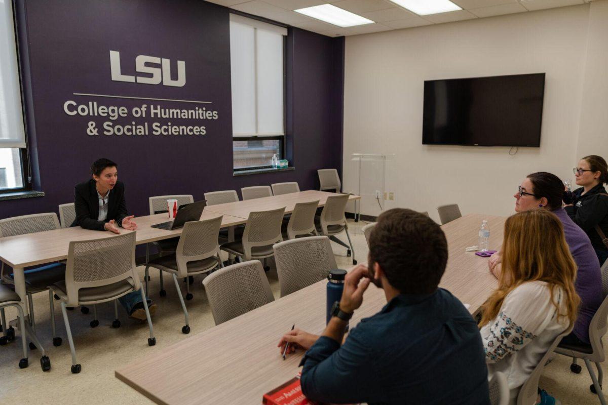 LSU Associate Professor of English Chris Barrett welcomes everyone to the meeting on Friday, Oct. 21, 2022, inside Hodges Hall on Field House Drive in Baton Rouge, La.