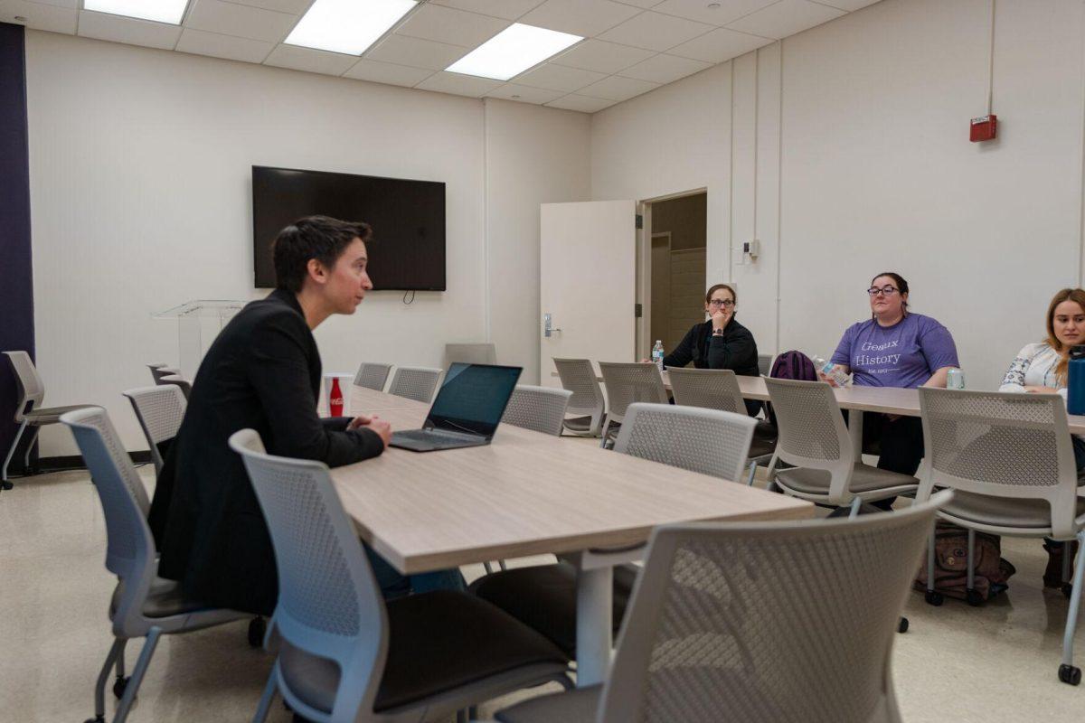 LSU Associate Professor of English Chris Barrett listens to graduate students on Friday, Oct. 21, 2022, at the Humanities and Social Sciences strategic meeting inside Hodges Hall on Field House Drive in Baton Rouge, La.