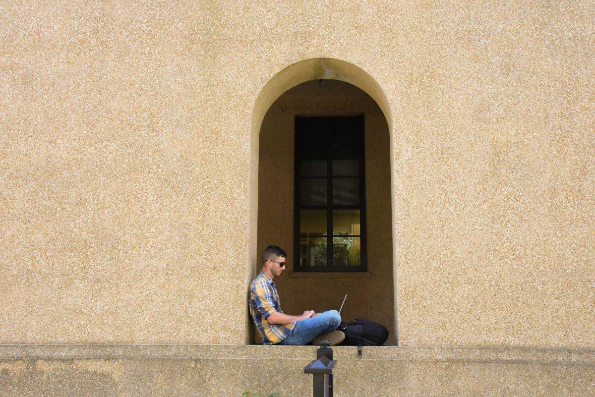 History senior Alexander Dunaway studies on Monday, Aug. 29, 2022, in the LSU Quad in Baton Rouge, La.