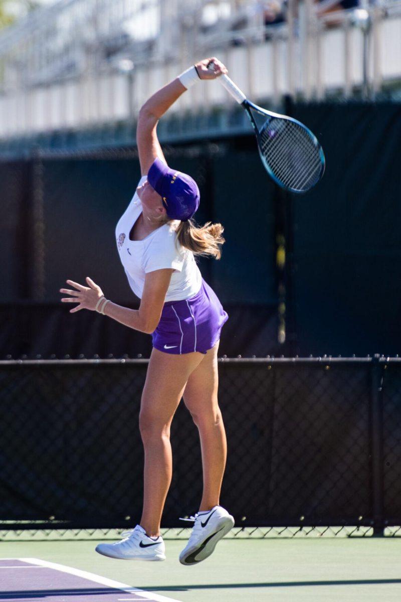 LSU women&#8217;s tennis senior Maggie Cubitt serves the ball Friday, Oct. 14, 2022, during the ITA Southern Regional in the singles round of 64 at the LSU Tennis Complex on Gourrier Avenue in Baton Rouge, La.