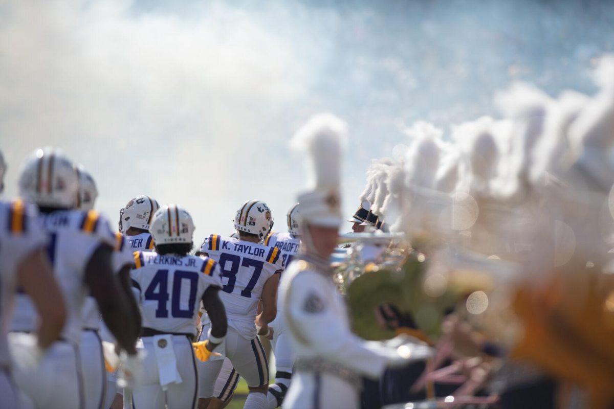 The LSU football team runs out on the field before the start of the game against Tennessee on Saturday, Oct. 8, 2022, in Tiger Stadium.