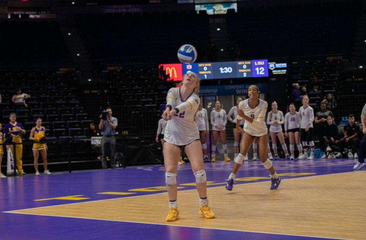 LSU volleyball freshman setter Maddie Waak (22) sets the ball on Wednesday, Oct. 5, 2022, before their 3-2 victory over Auburn in the Pete Maravich Assembly Center on N. Stadium Drive.