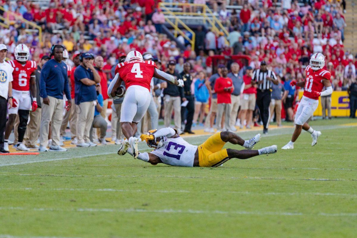 LSU football fifth-year senior safety Joe Foucha (13) dives for the tackle on Saturday, Oct. 22, 2022, during LSU&#8217;s 45-20 victory over Ole Miss in Tiger Stadium in Baton Rouge, La.