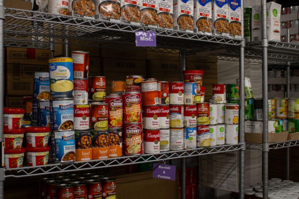 Canned goods line the shelves on Thursday, Oct. 6, 2022, inside the food pantry at the LSU Student Union in Baton Rouge, La.